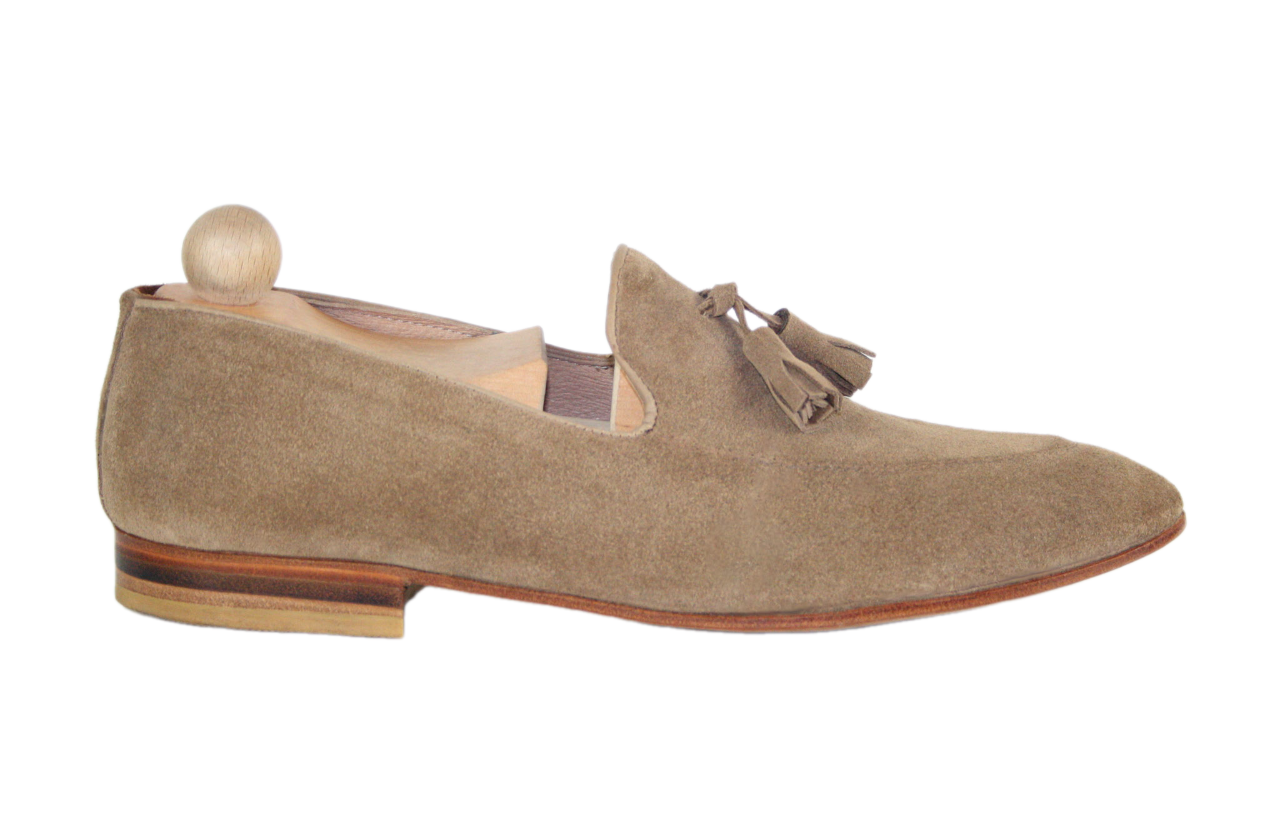 Classic light brown suede Tassel loafer model.