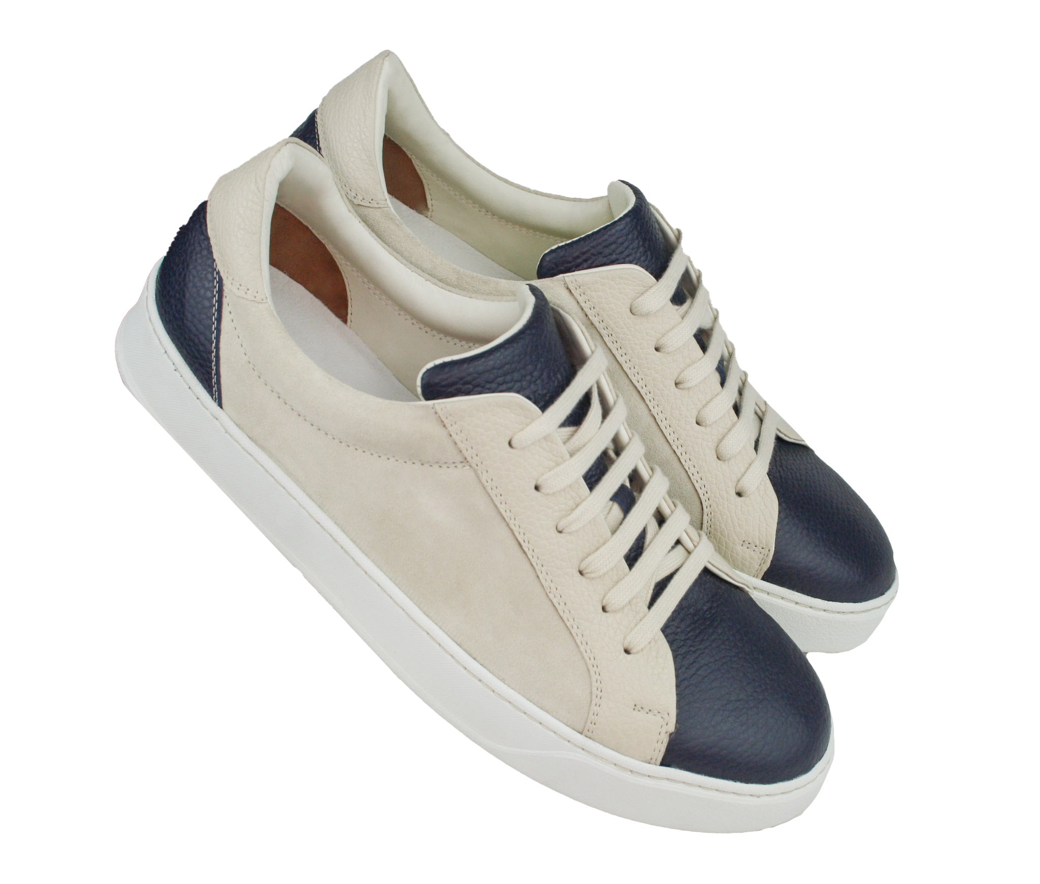 Exclusive dark blue–beige sneaker, combined with suede leather and white sole
