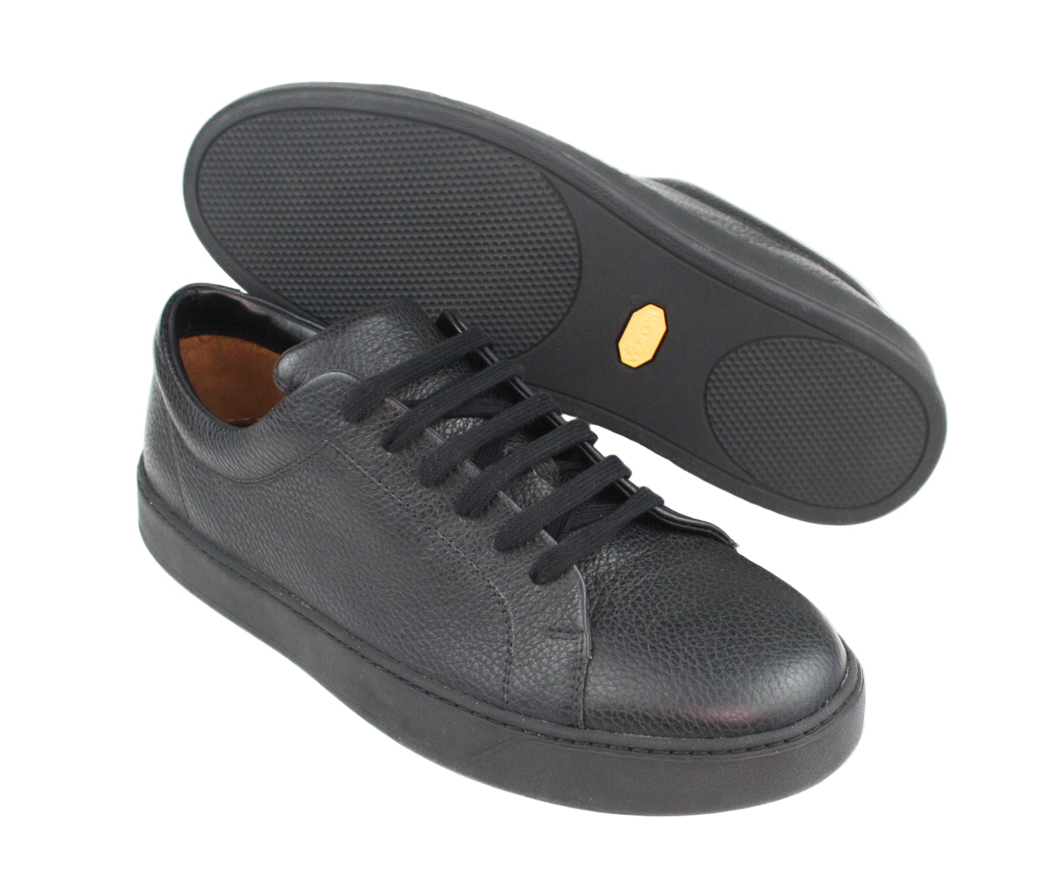 Exclusive black sneaker with black sole