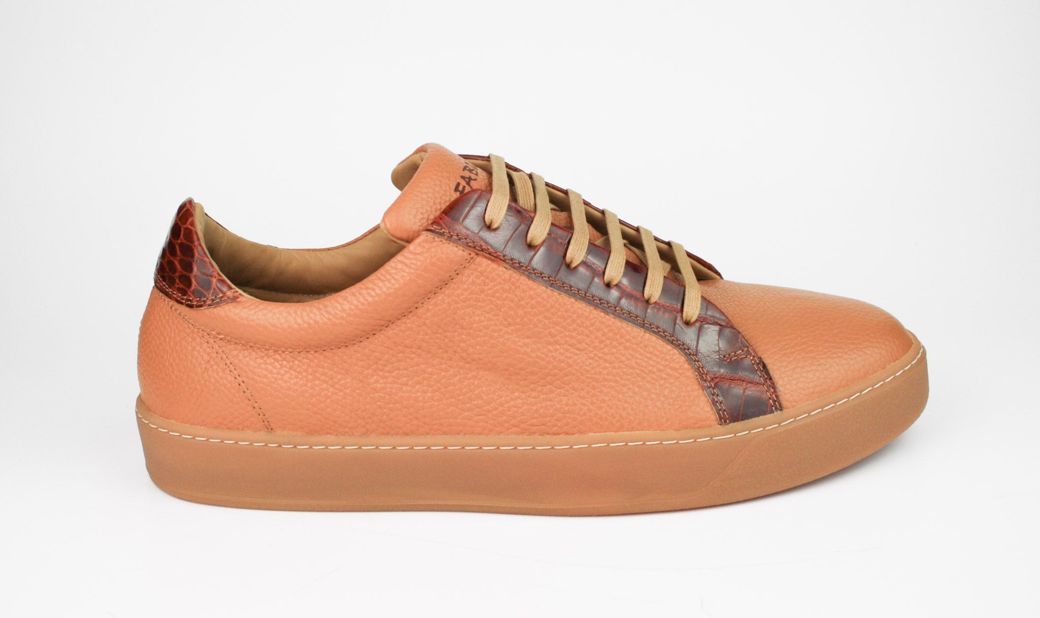 Exclusive brown sneaker combined with brown crocodile leather and beige sole
